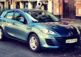 Mazda 3 Хетчбэк (BL, 2009-2013) 1.6 AT Touring
