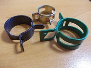 Хомуты пружинные